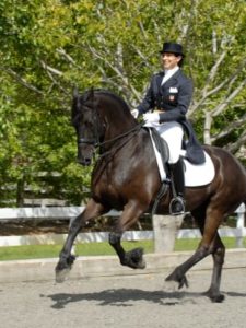 Jane Savoie and her 20-year-old semi-retired Grand Prix Friesian gelding, Moshi.